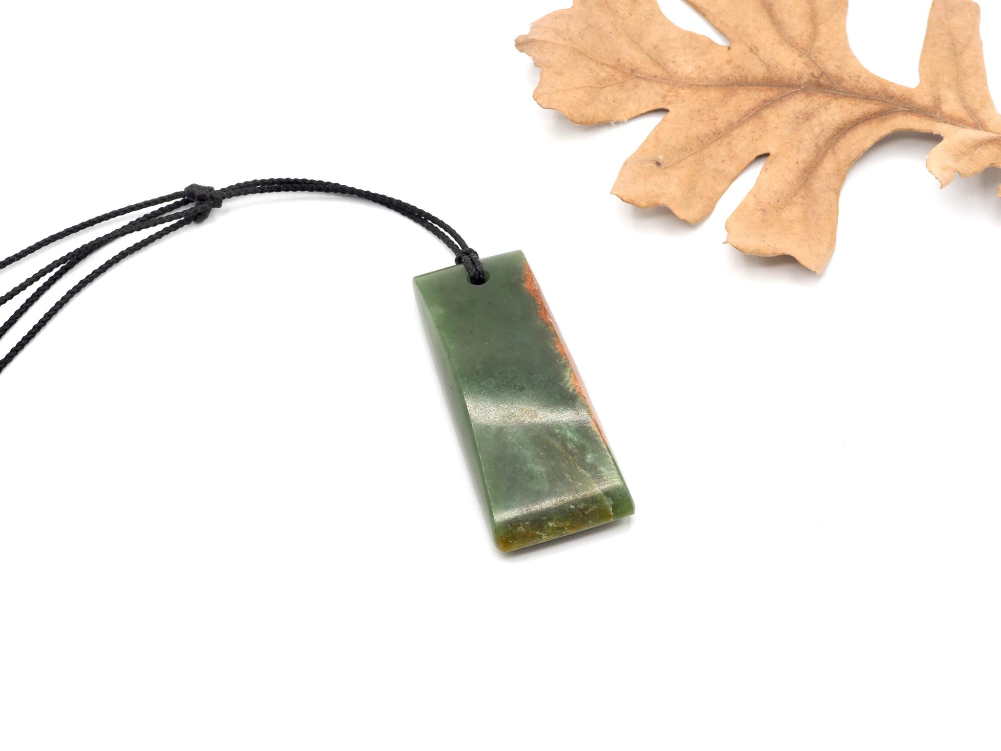 Hand Carved Wyoming Apple Green Nephrite Jade Celt Pendant