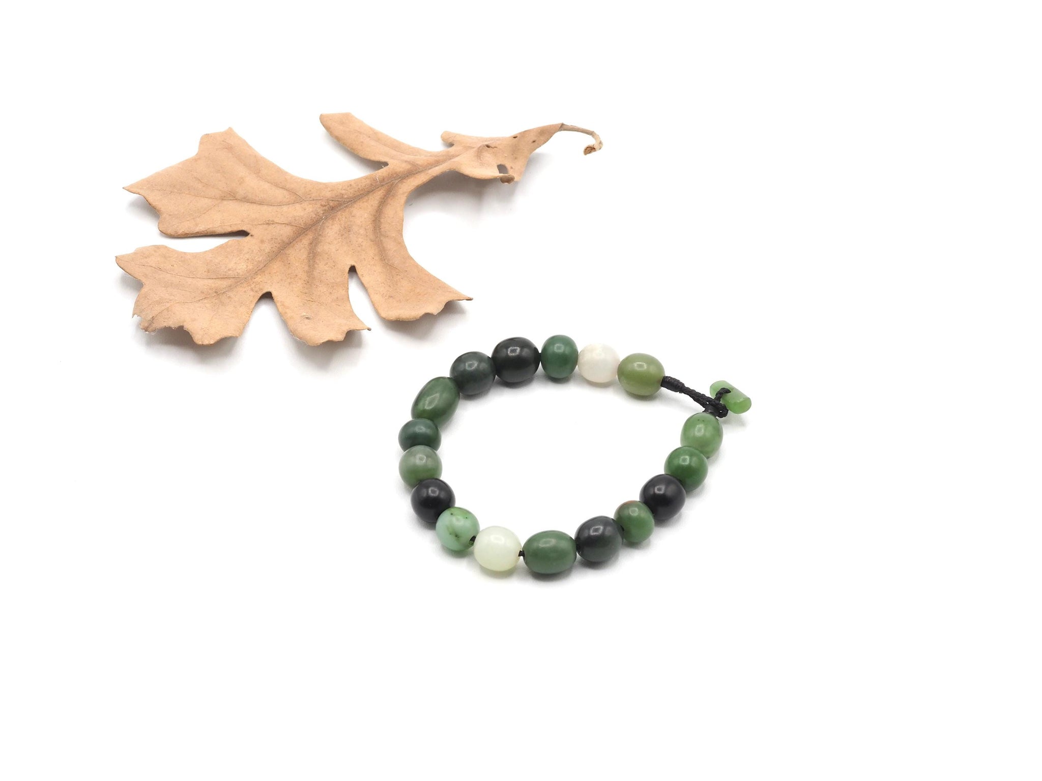 World Jade Bracelet - Hand Caved Nephrite Jade beads